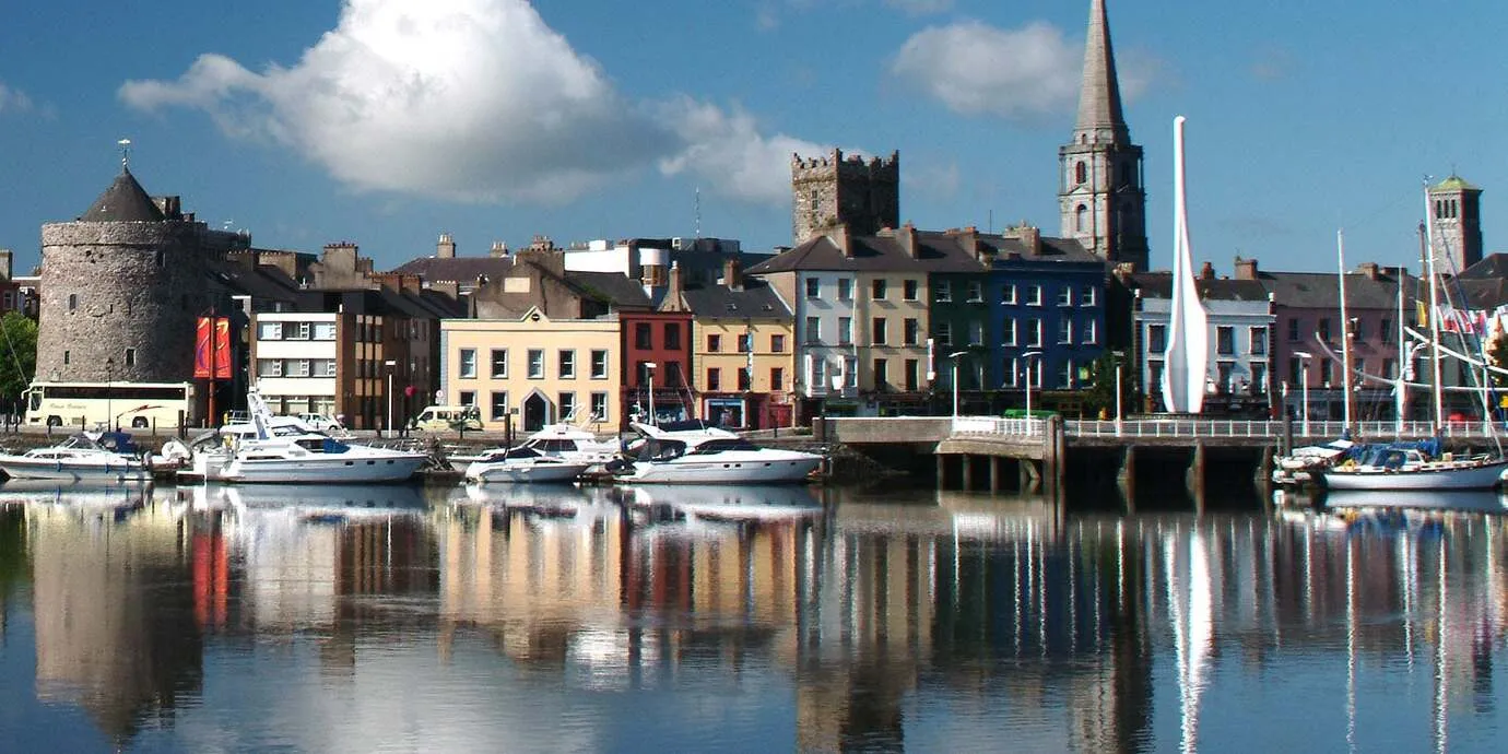 Waterford's Quay seen across the River Suir, Reginald's Tower and the cathedral spire above the waterfront